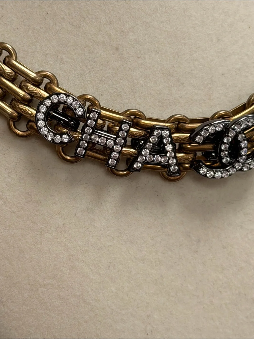 CHANEL Gold Chain Necklace with Crystal Logo Letters